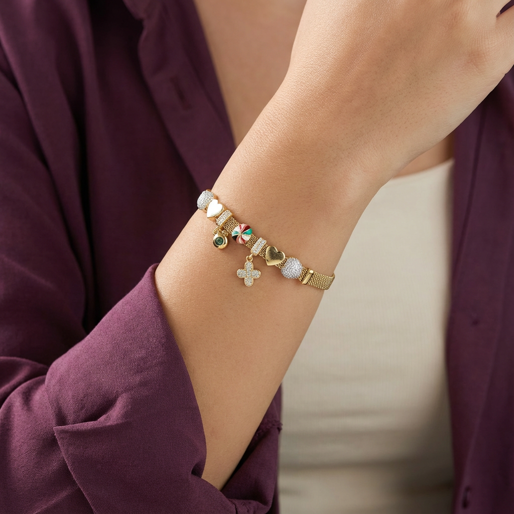 أسورة زاريا ذهب عيار 18 بتعليقة