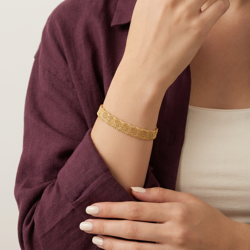 أسورة ذهب عيار 18 بتصميم شبكة