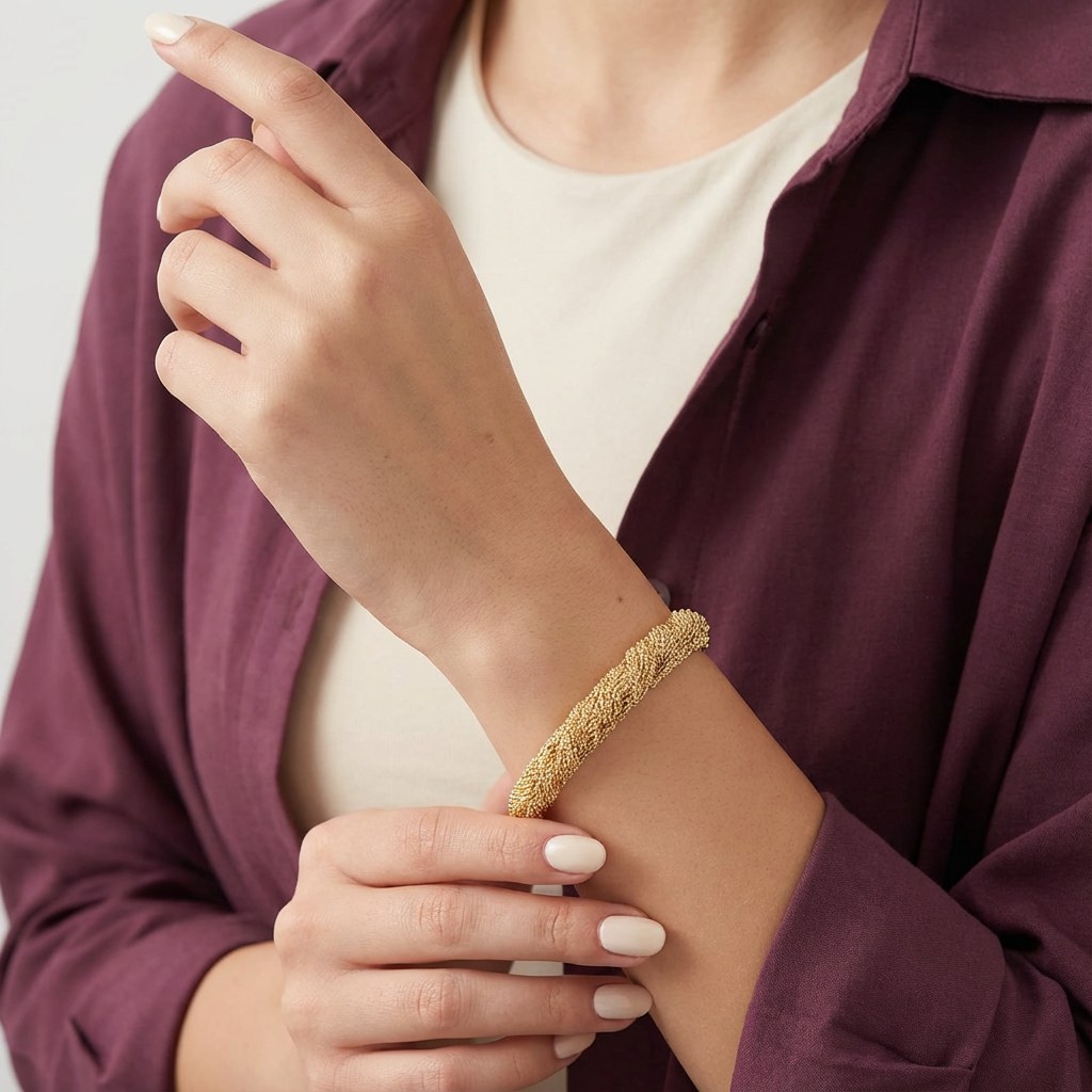 أسورة زينه ذهب عيار 18 بتصميم مجدول أنيق