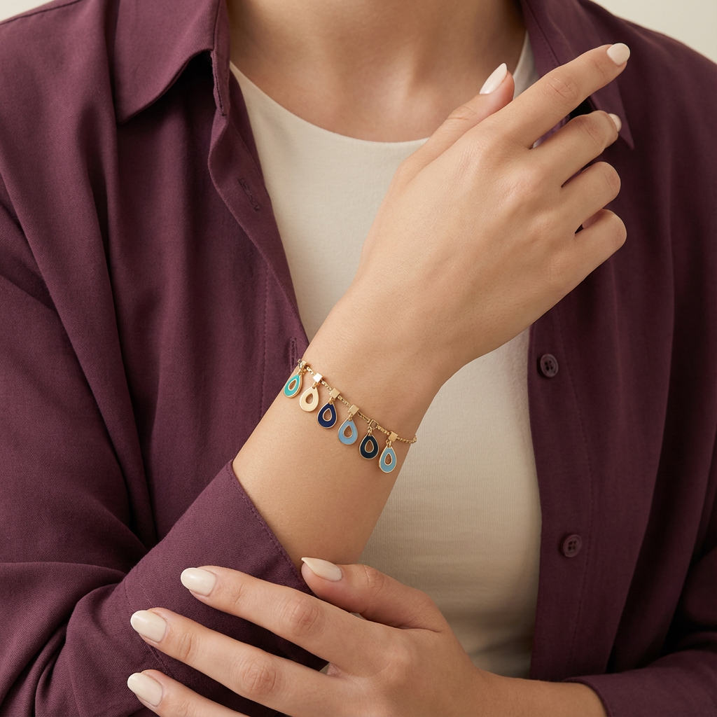 أسورة ذهب عيار 18 بتعليقات دمعة ملونة