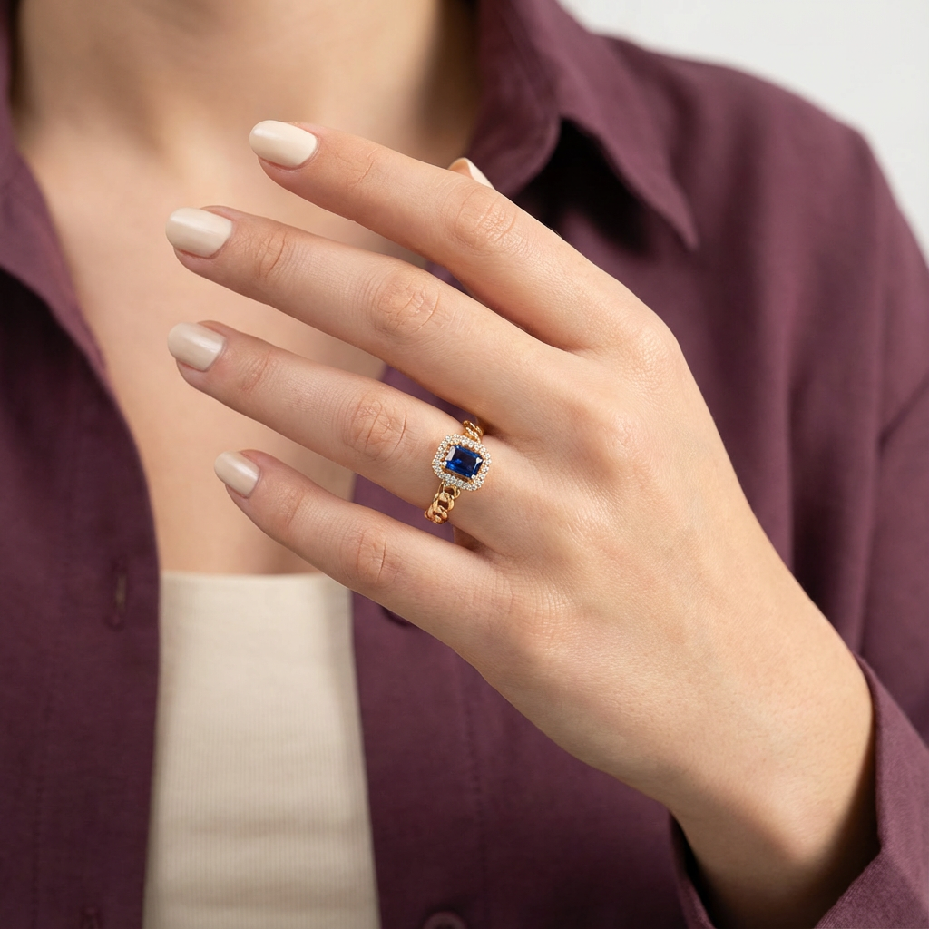 خاتم ذهب عيار 18 بحجر أزرق مرصع