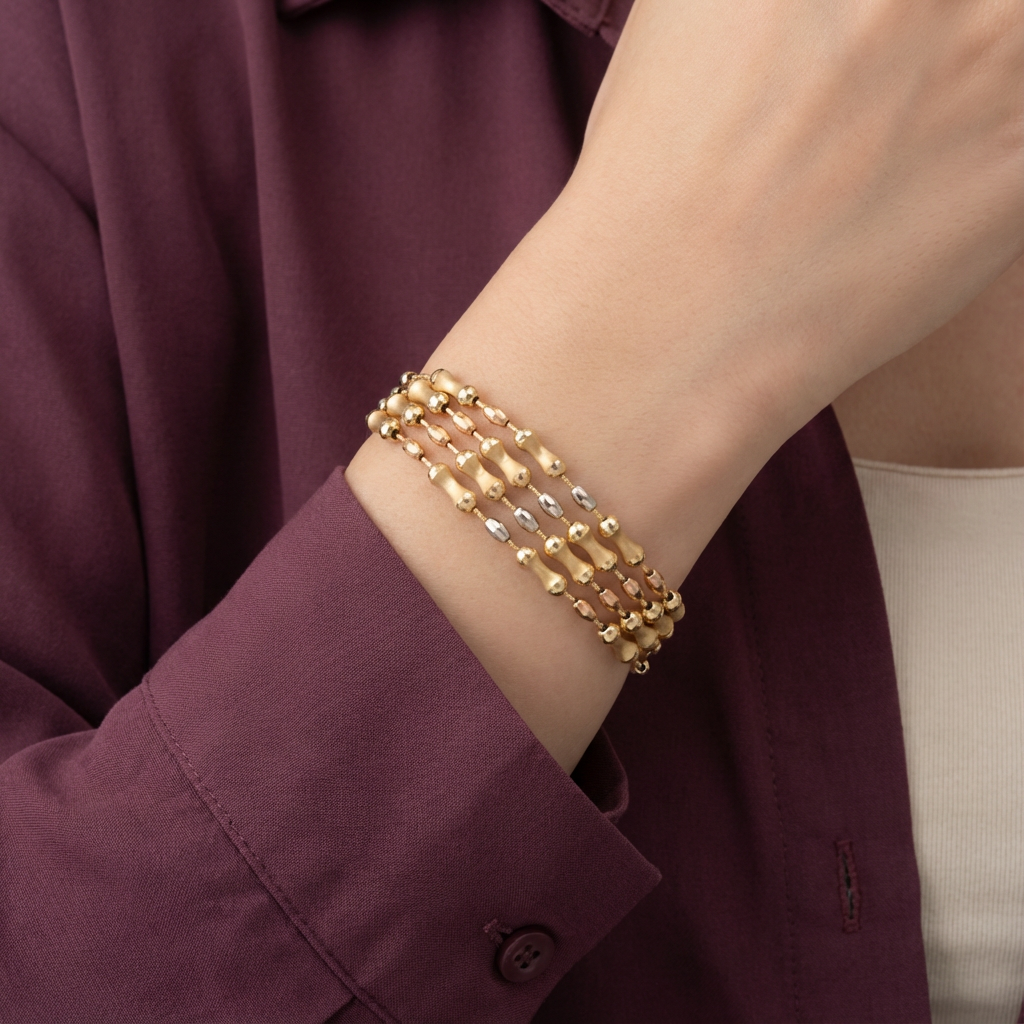 أسورة ذهب عيار 18 بتصميم مجدول في المنتصف