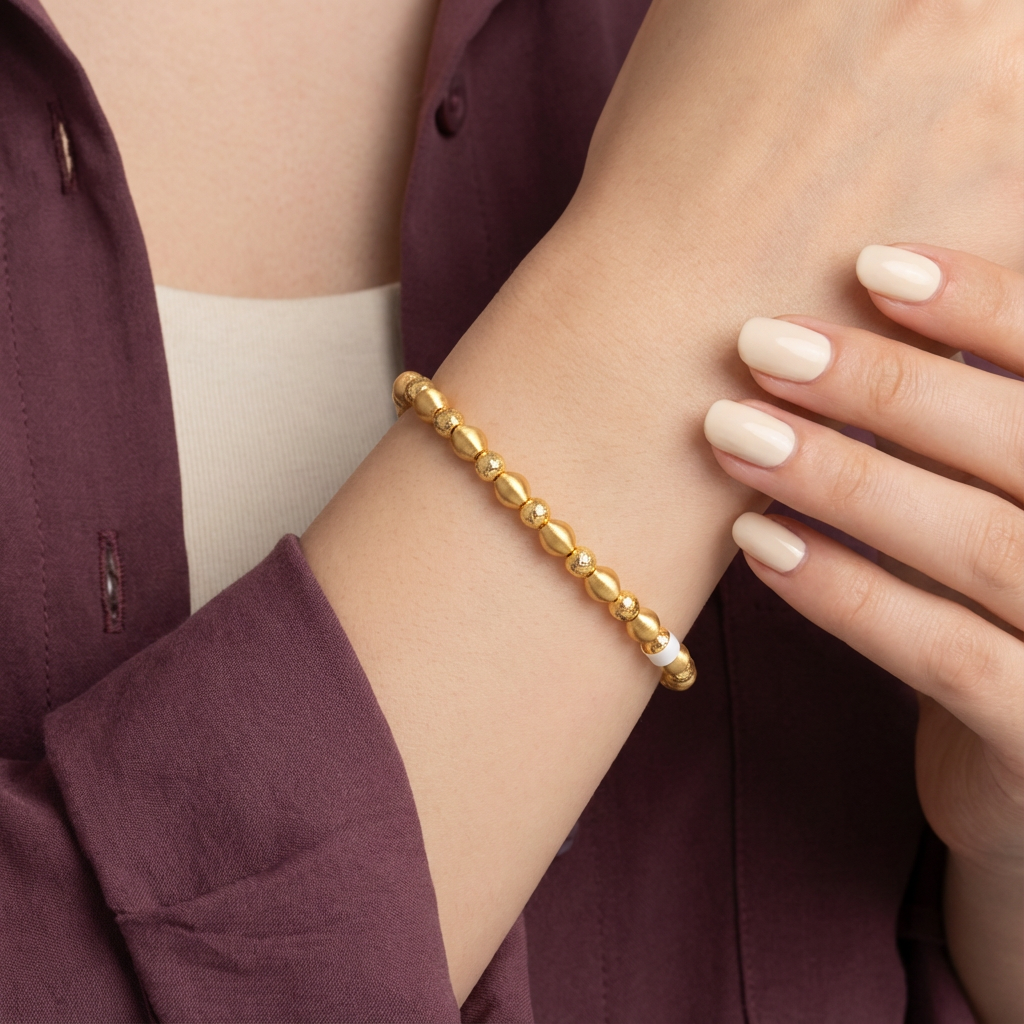 أسورة ذهب عيار 21 بحبات ذهبية